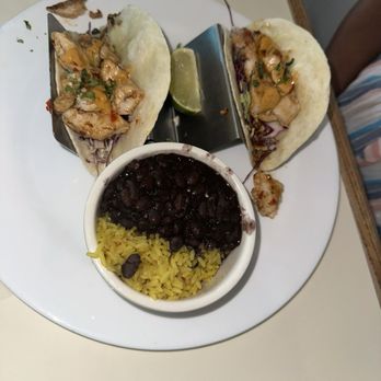 Noosa Beach Grill - Mahi Mahi Fish tacos with rice and beans - American Near Me - Kill Devil Hills, North Carolina Noosa Beach Grill - Mahi Mahi Fish tacos with rice and beans - American Near Me - Kill Devil Hills, North Carolina