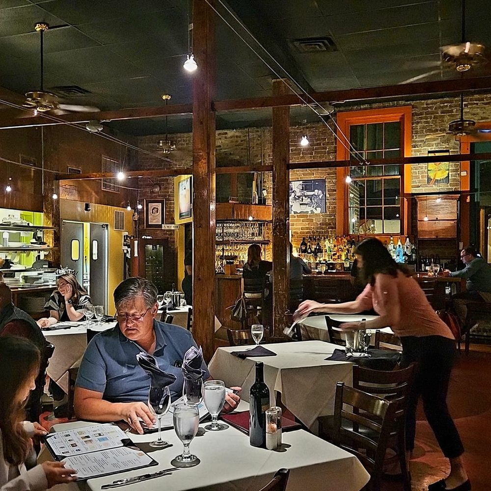 NoJa - a group of people sitting at tables in a restaurant - New American Near Me - Mobile, Alabama NoJa - a group of people sitting at tables in a restaurant - New American Near Me - Mobile, Alabama