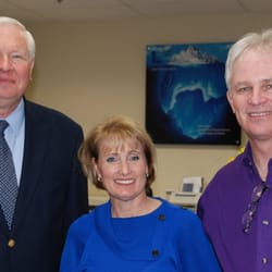 Landmark Image - Pastor Oestman Blesses our Business, pictured with owners PJ and Ray Goodson