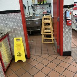 Firehouse Subs - No tea made high chairs holding door open