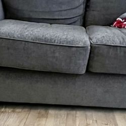 The Furniture Store - You can see how this couch is drooping towards the center. It started doing this immediately and is not even used that often.
