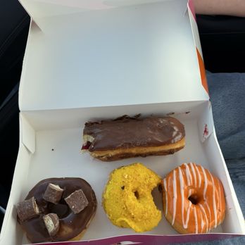 Amy's Donuts - Raspberry filled Long John, zesty lemon, creamsicle, and Twix donuts - Donuts Near Me - Albuquerque, New Mexico