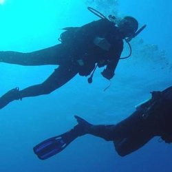 Adventures In Scuba North Carolina - Owners, Deb & Chris leading a dive.