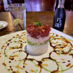Sushi Axiom - WOW!!! Tower of Pisa Four layer of spicy tuna, crab, avocado, cucumber & sushi rice topped with tobiko and 4 season sauce