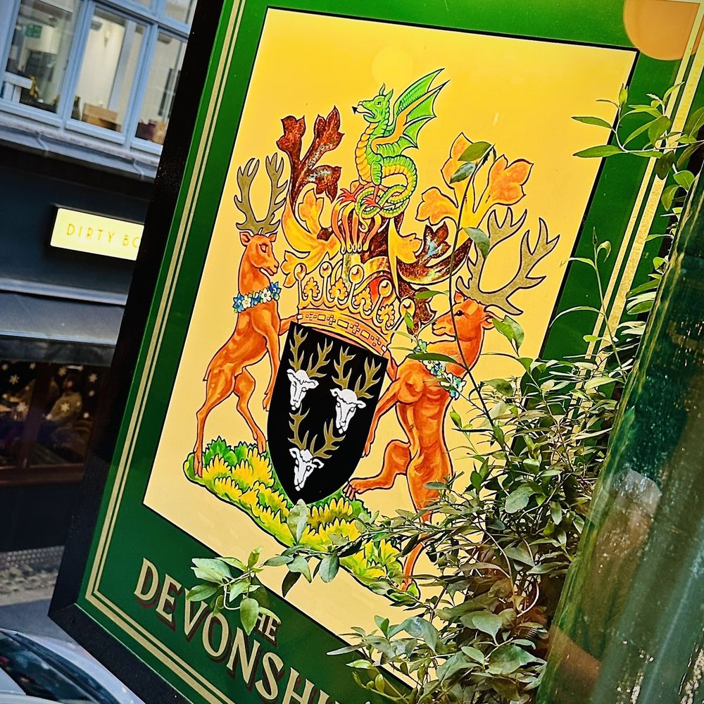 Devonshire Arms - Signage from restaurant window - Pubs Near Me - London, XGL Devonshire Arms - Signage from restaurant window - Pubs Near Me - London, XGL
