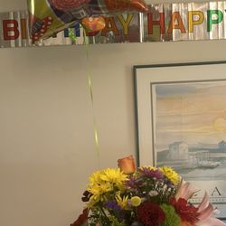 Flower Time - Flowers and balloon ordered for my daughter to surprise her while on vacation in Crystal River, FL.