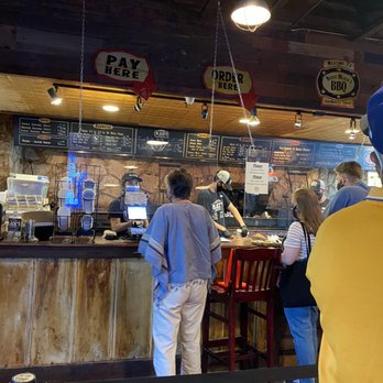 Black's BBQ - Standing in line where you order your meat behind the counter - Barbeque Near Me - San Marcos, Texas