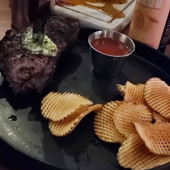 Khan Saab Desi Craft Kitchen - Steak with spice rub and herb butter served with house made chips - Pakistani Near Me - Fullerton, California Khan Saab Desi Craft Kitchen - Steak with spice rub and herb butter served with house made chips - Pakistani Near Me - Fullerton, California