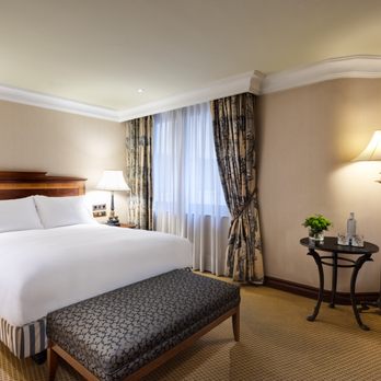 InterContinental Madrid - Spacious guestroom with armchair at InterContinental Madrid. - Hotels Near Me - Madrid, M