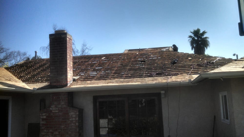 Slide of Wolfe Roofing Company