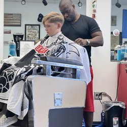 ShopHands Barbershop - My boy mid cut, skeptical. But he was SO HAPPY with the final look! JB doing his thing!