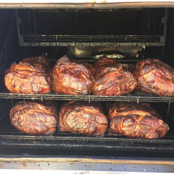 Jon Jon's BBQ and Catering - Smoking our award winning pork over cherry wood! - Food Trucks Near Me