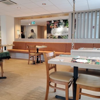 Gingergrass - the interior of a restaurant with tables and chairs - Vietnamese Near Me - St. John's, Newfoundland and Labrador Gingergrass - the interior of a restaurant with tables and chairs - Vietnamese Near Me - St. John's, Newfoundland and Labrador