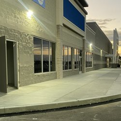 Austill Construction - New sidewalk, curb and bollards
