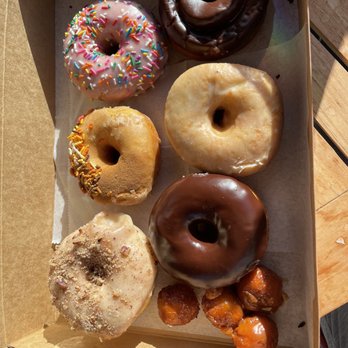 Devil's Dozen Donut Shop - Butter pecan, apple cider glaze, homer, chocolate old fashioned, vanilla glaze and chocolate glaze. - Donuts Near Me - San Diego, California Devil's Dozen Donut Shop - Butter pecan, apple cider glaze, homer, chocolate old fashioned, vanilla glaze and chocolate glaze. - Donuts Near Me - San Diego, California