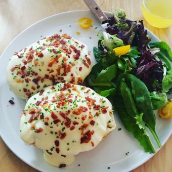 Over Easy - The Potato purée over poached eggs on a thick cut French bread type toast, sprinkled with bacon bits. 100% recommend this - Breakfast & Brunch Near Me - Kailua, Hawaii