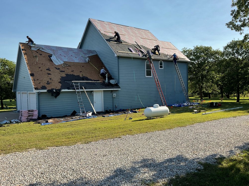 Slide of Mike and Mike Roofing