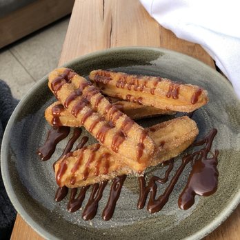 El Encanto - Delicious fresh-made churros drizzled with goat-milk caramel. The stuff dreams are made of! - Bars Near Me - Kirkland, Washington