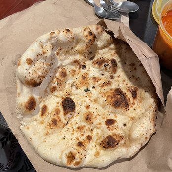 Raaja's Butter Chicken - Garlic Naan - Food Delivery Services Near Me Raaja's Butter Chicken - Garlic Naan - Food Delivery Services Near Me