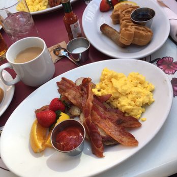 Carnation Cafe - Bacon (4 slices), eggs, potatoes, and bread. With a side of kids Mickie waffles. - American Near Me - Anaheim, California