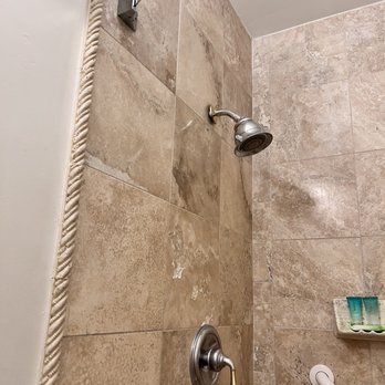 14 West - Shower head plate hanging out also no hot water for the first 2 showers - Hotels Near Me - Laguna Beach, California 14 West - Shower head plate hanging out also no hot water for the first 2 showers - Hotels Near Me - Laguna Beach, California