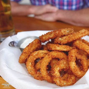Original Joe's - onion rings on a plate - Bars Near Me - Fort St John, British Columbia Original Joe's - onion rings on a plate - Bars Near Me - Fort St John, British Columbia