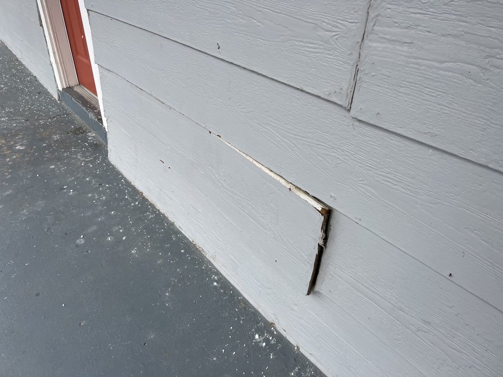 Slide of Sagan Commercial Roofing