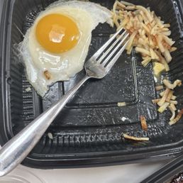Undercooked eggs and not crispy hashbrowns. Undercooked eggs and not crispy hashbrowns.