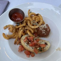 Meatball, bruschetta, and curly fries Meatball, bruschetta, and curly fries