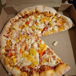a half eaten pizza in a box