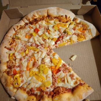 Chito's Pizza - a half eaten pizza in a box - Mediterranean Near Me - Toronto, Ontario