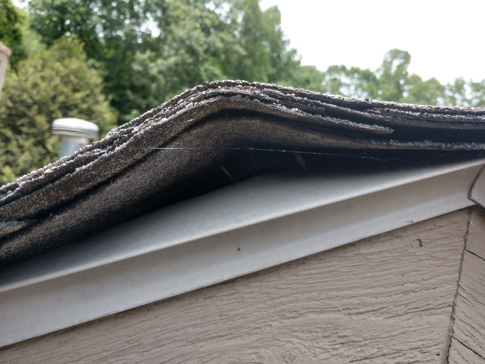 Slide of Christian Brothers Roofing Contractor