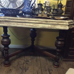 Roadside Antiques - There was a huge dining room table that he cut in half and made two end tables and he is painting them white rustic farmhouse style