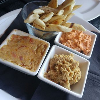 Twist Martini - Dip trio, not enough pita to dip with. Humus had no flavor but the crab one was good. - New American Near Me - Virginia Beach, Virginia Twist Martini - Dip trio, not enough pita to dip with. Humus had no flavor but the crab one was good. - New American Near Me - Virginia Beach, Virginia