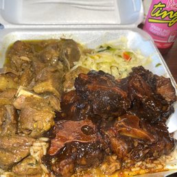 Jamaican Curry Goat/Oxtails with Rice & Peas/Steamed Cabbage/ Pink Ting