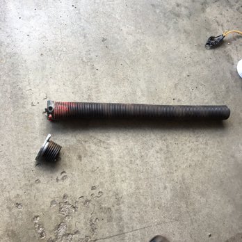 A1 Garage Repair - Broken spring - Garage Door Services Near Me - Plain City, Ohio