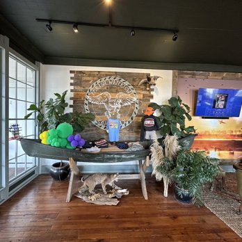 Parish Waterfowl - a living room with wood flooring - Coffee & Tea Near Me - Vicksburg, Mississippi Parish Waterfowl - a living room with wood flooring - Coffee & Tea Near Me - Vicksburg, Mississippi