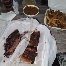 Brisket and back ribs with 2 sides Brisket and back ribs with 2 sides