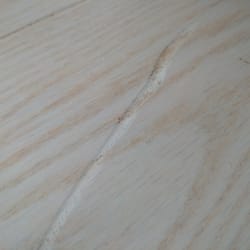 Furnish'N Style - Dragged couch on hardwood by delivery guys. Store denied responsibility, delivery truck not answering calls