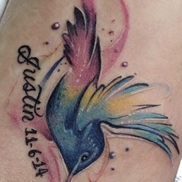 Tattoo done by Raul, highly recommend. Hand is light and is professional. Explains how to take care of tattoo.