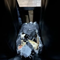 Touchstar Cinemas - Spring Hill 8 - Broken arm chair between seats. They blamed it on customers who slam the arm rests.