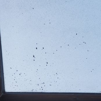 Quality Roofing And Construction - Ruined my skylight with overspay - Roofing Near Me