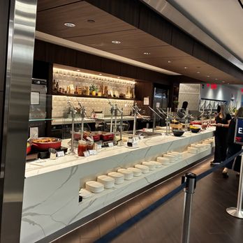 Delta Sky Club - Buffet Line - Airport Lounges Near Me - Jamaica, New York Delta Sky Club - Buffet Line - Airport Lounges Near Me - Jamaica, New York