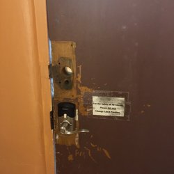 Los Sueños de Santa Fe RV Park & Campground - Inside of woman's bathroom door. Needs some tlc and cleaning