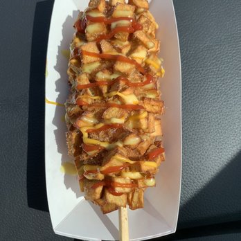 Jongro Rice Hotdog - 3/27/21 sweet potato mozzarella dog with ketchup, cheddar cheese, and honey mustard drizzle - Hot Dogs Near Me - Flushing, New York