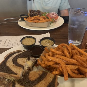 Smoke Brewing Company - Brisket Sandwich and the Smoke BBQ Burger both with sweet potato fries - Bars Near Me - Lee's Summit, Missouri Smoke Brewing Company - Brisket Sandwich and the Smoke BBQ Burger both with sweet potato fries - Bars Near Me - Lee's Summit, Missouri