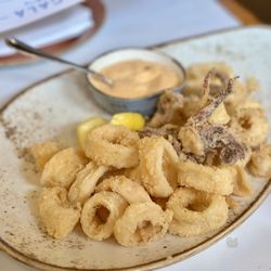 Scala Osteria - Calamari Fritti - Pt. Judith calamari, lightly breaded & fried, served with spicy aioli, lemon