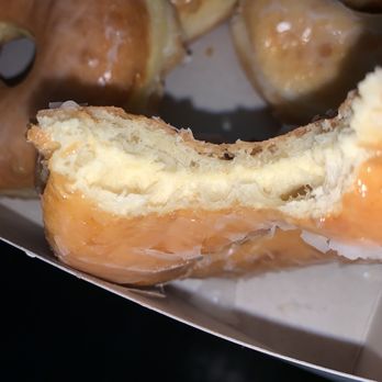Donut Palace - a half eaten doughnut with a bite taken out of it - Donuts Near Me - Rialto, California Donut Palace - a half eaten doughnut with a bite taken out of it - Donuts Near Me - Rialto, California