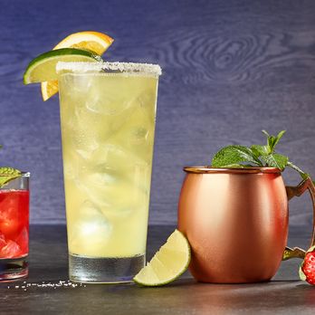 Miller's Ale House - A glass of House Margarita and a Grey Goose Mule - Sports Bars Near Me - Estero, Florida Miller's Ale House - A glass of House Margarita and a Grey Goose Mule - Sports Bars Near Me - Estero, Florida