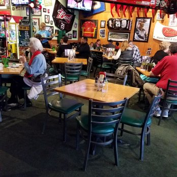 Quaker Steak & Lube - people sitting at tables in a restaurant - Steakhouses Near Me - Boardman, Ohio Quaker Steak & Lube - people sitting at tables in a restaurant - Steakhouses Near Me - Boardman, Ohio